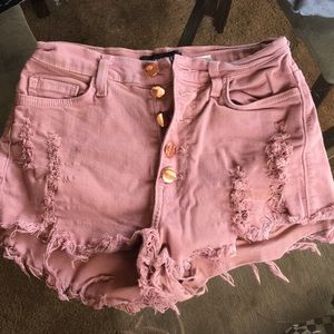 Pink high wasted ripped shorts